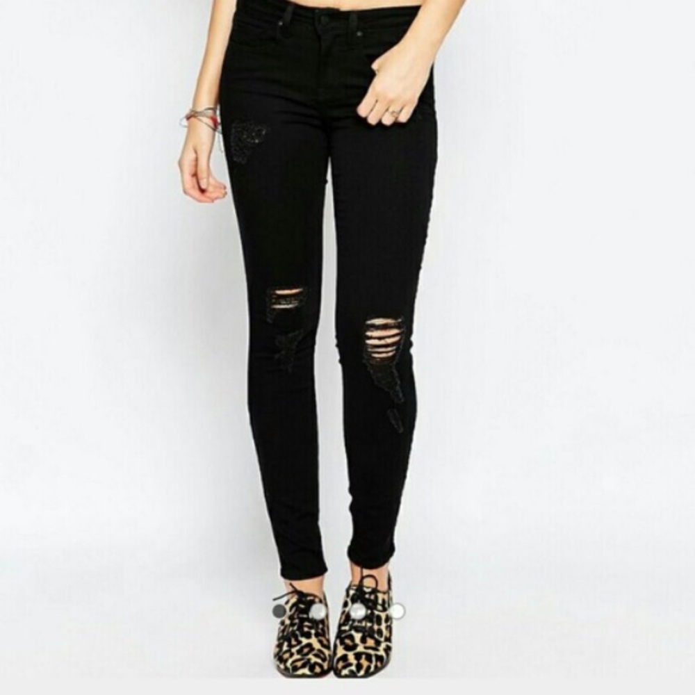 Low rise Genetic black distressed denim jeans